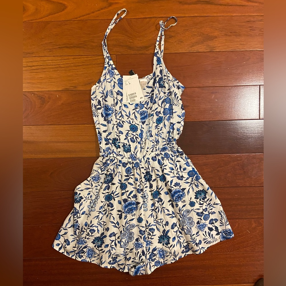 NWT H&M romper. Blue floral. Size 0